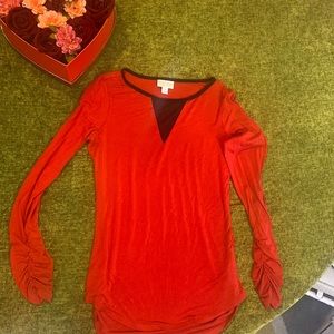Red, size M, it’s stretch, transparent from the front